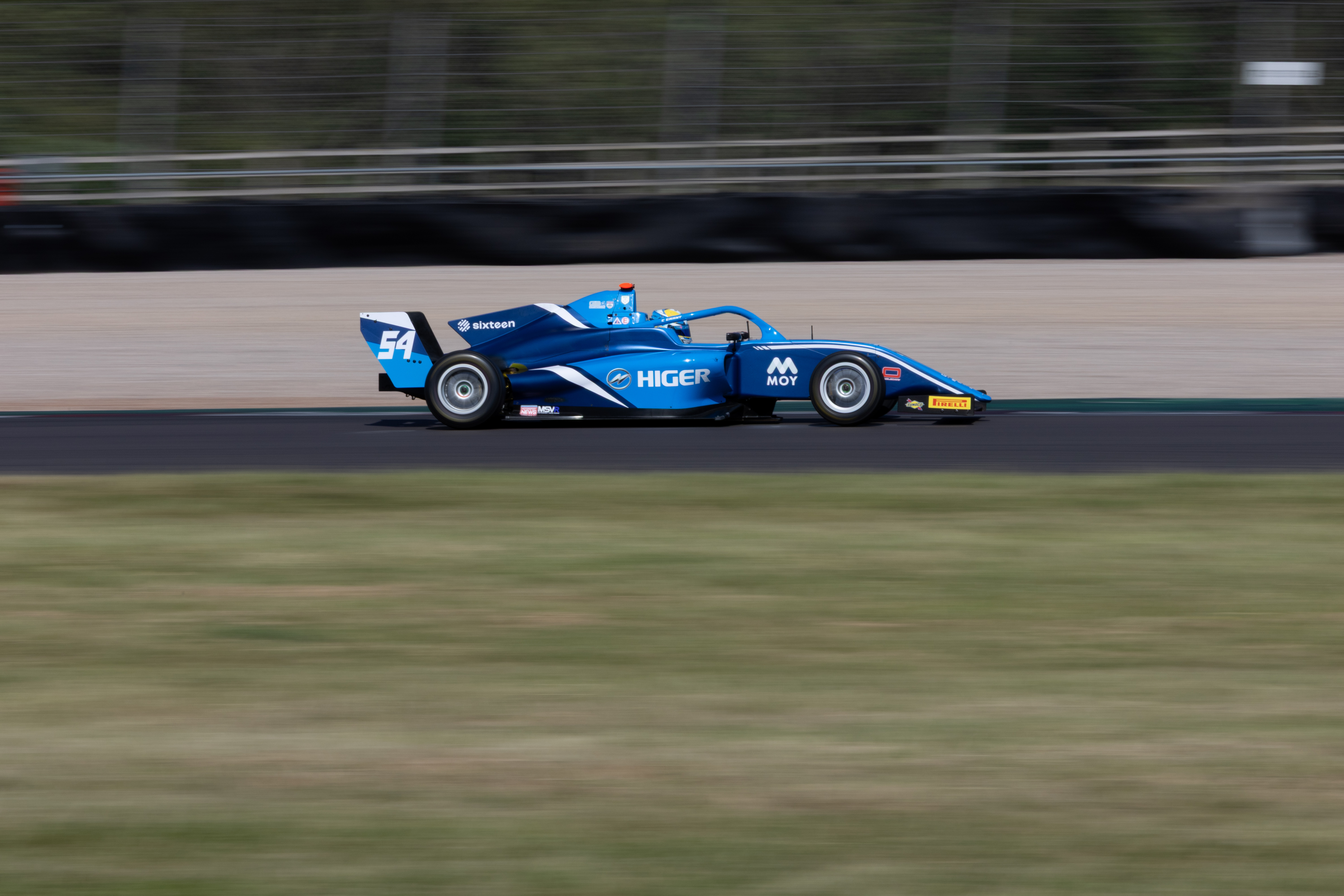 Conor Grant’s blue number 54 car with Higer, MOY and Sixteen branding
